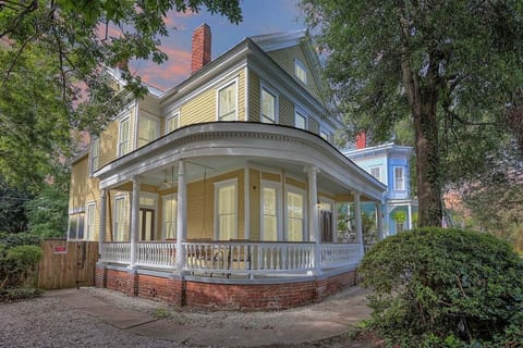 Victorian beauty with a welcoming wraparound porch and classic Southern charm.