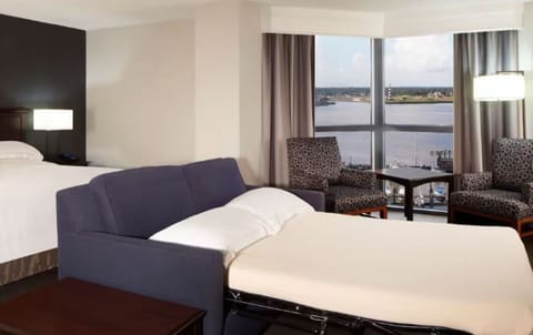 Unwind on the sleeper sofa with calming waterfront views.