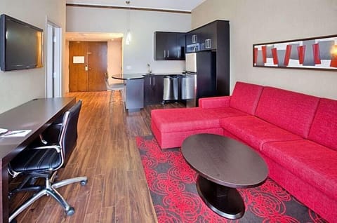 32-inch flat-screen TV with cable channels, TV, iPod dock