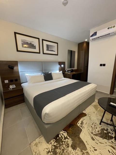 Deluxe Room | Desk, laptop workspace, free WiFi, bed sheets
