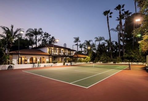 Serve, volley, and soak up the sun on your private lighted tennis court.