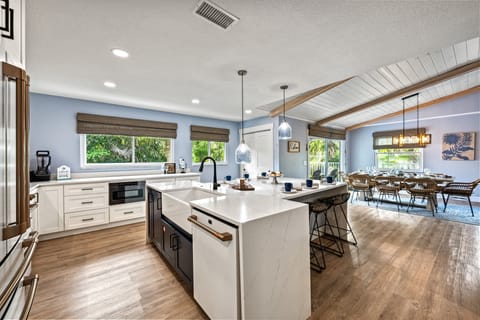 This open kitchen and dining space feels warm and welcoming.