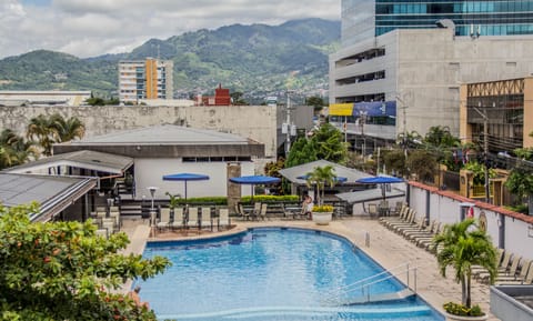 2 outdoor pools, pool umbrellas, sun loungers