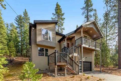 Peaceful mountain setting with the home surrounded by mature pine trees and natural forest, while hiking, biking and snowshoeing begin across the street, steps from the property.