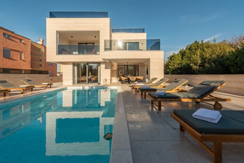 Outdoor pool, sun loungers