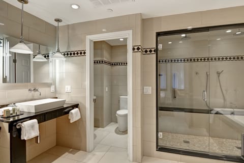 Designer toiletries, hair dryer, bathrobes, towels