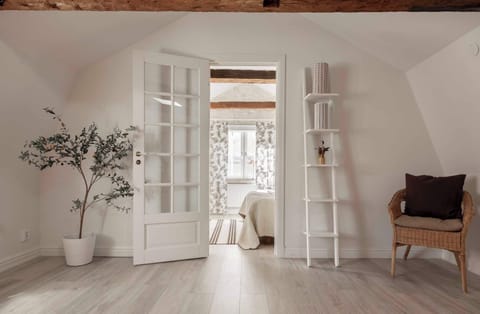 Beautiful hallway connecting to room.