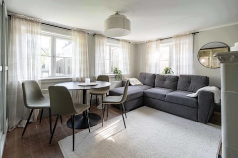The comfortable living room with a sofa bed that fits 2 guests.