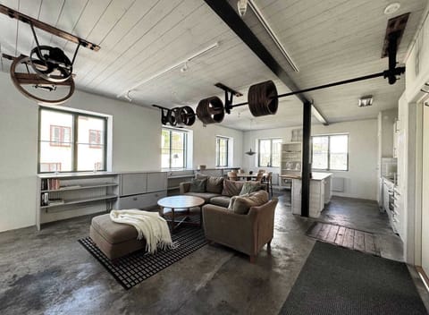 View of the living room, kitchen and dining area.