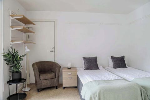 Overlooking the sleeping area where the two single beds can be combined into a double bed.