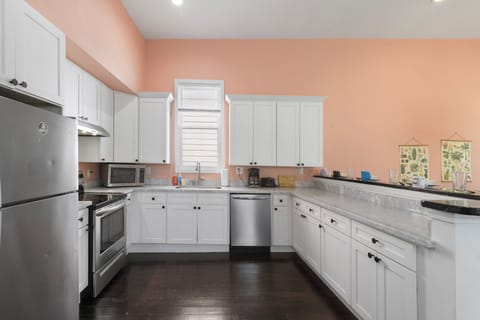 Kitchen- stainless steel appliances, coffee maker, coffee, creamer, sugar