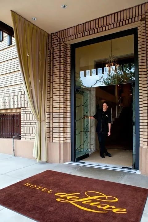 Enter through our sophisticated doorway, where impeccable service and refined elegance set the stage for your stay.