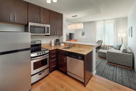 Premium bedding, desk, laptop workspace, soundproofing