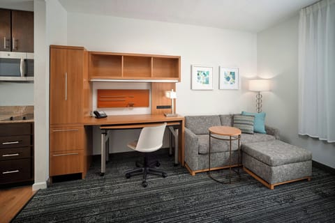 Premium bedding, desk, laptop workspace, soundproofing