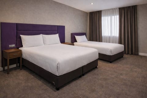 Deluxe Triple Room | Egyptian cotton sheets, premium bedding, laptop workspace