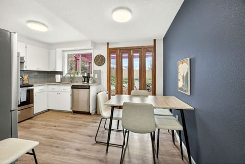 Cozy dining area and well equipped kitchen