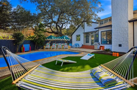 Float in the pool, lounge on the grass and sway in the hammock—all in one dreamy backyard. It’s the perfect combination of activity, relaxation, and pure vacation vibes for every guest.