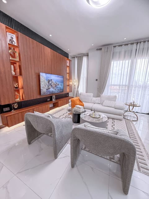 Comfort Apartment, Balcony, City View | Living area | Flat-screen TV