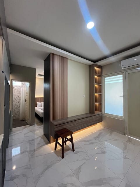Family Apartment | Desk, laptop workspace, blackout drapes, soundproofing