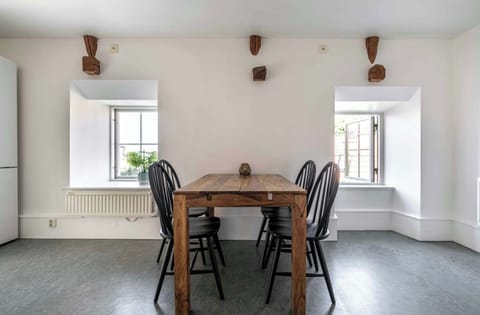 The fully equipped kitchen with all essentials you will need for a home cooked meal. There is an oven, stove, dishwasher, fridge, freezer, kettle, coffee maker, microwave and essentials.