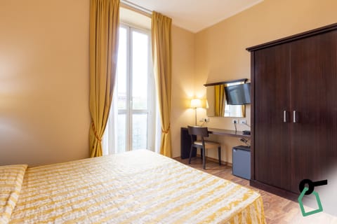 Standard Double or Twin Room | Minibar, in-room safe, free WiFi, bed sheets