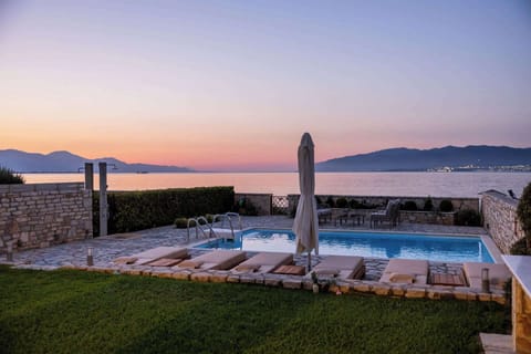 Sunset views over the sea from the private pool