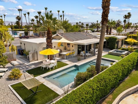 Aerial backyard view with pool, spa & private outdoor oasis