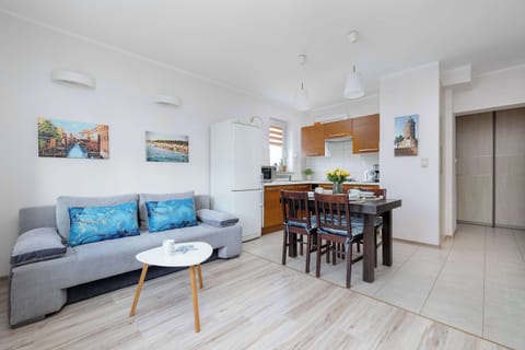Relax in the stylish living room with a comfortable sofa and modern decor.