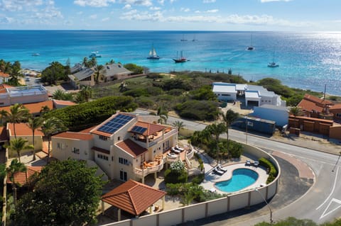 the Villa and it’s inviting pool area, with an amazing ocean view