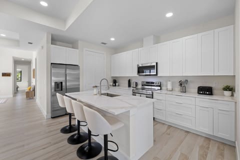A fully equipped kitchen has everything you may need.