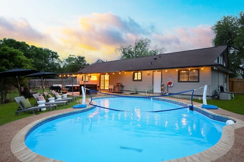 Experience tranquility at twilight—your private pool comes alive with the soft glow of evening light.