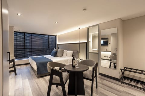 Deluxe Room, City View | Desk, laptop workspace, blackout drapes, soundproofing