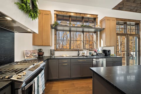 Gas Stove in the Well-Equipped Kitchen