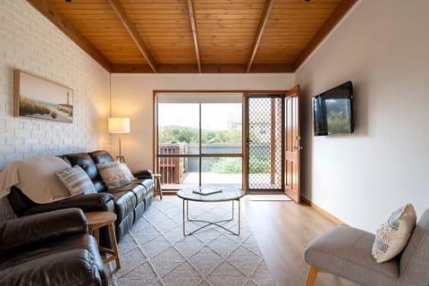 Inviting living space opening to the outdoors, perfect for relaxing and unwinding