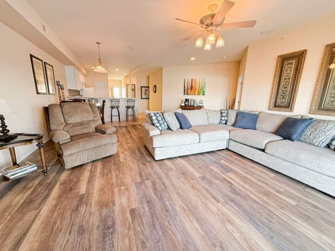 Stretch out and unwind in this bright, open-concept living space with plush seating and modern lake-home style.