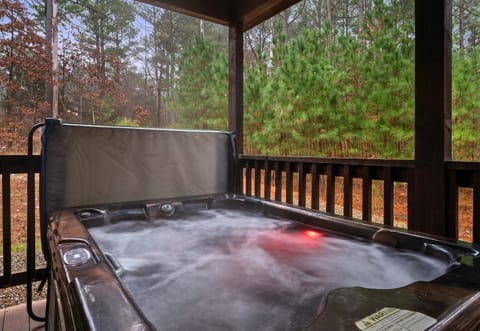 The private hot tub is tucked among the pines, creating a quiet, relaxing spot to unwind any time of day or night.