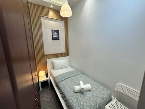 Economy Single Room, Balcony, City View | Iron/ironing board, free WiFi