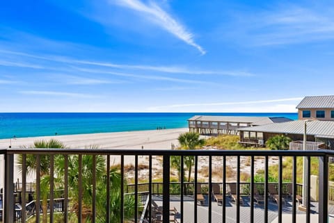 Balcony view facing Pineapple Willy’s & the Gulf next door