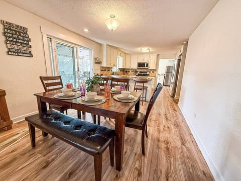Gather and dine together in this spacious, open-concept dining area, perfect for shared meals and special moments.
