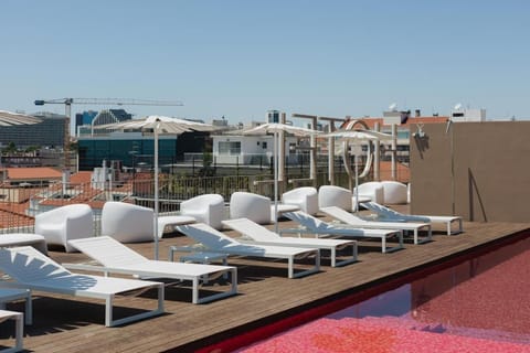 Soak up rooftop vibes with panoramic views and chic loungers.