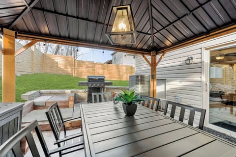 Gather under the covered gazebo for morning coffee, meals off the gas grill, and relaxed evenings together in your private fenced backyard.