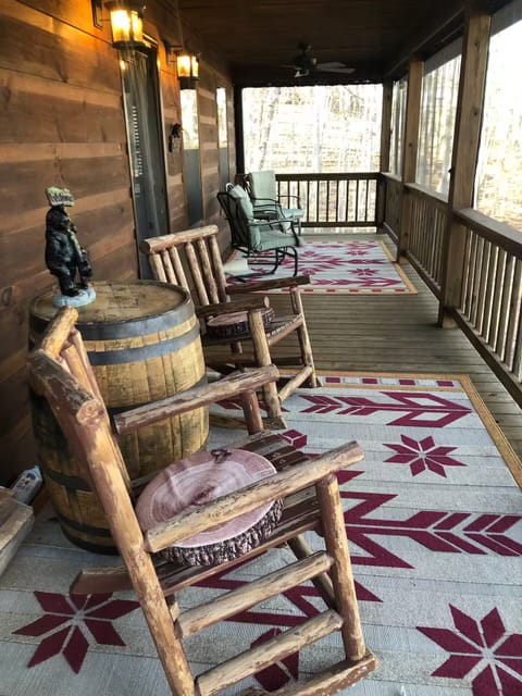 Screened in porch with a lot of seating space