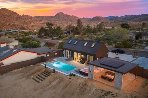 Sol + Shadow is minutes from downtown Joshua Tree and the edge of the National Park, with two bedrooms, a pool, a spa, and open desert in every direction.