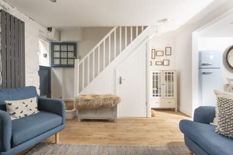 Living room with access to upstairs area and stable door - Happy Days Cottage