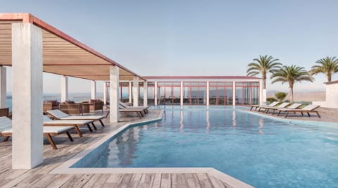 Seasonal outdoor pool, sun loungers