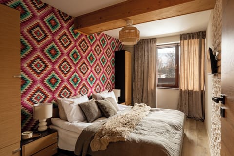 Deluxe Apartment, Balcony | Living area | Flat-screen TV