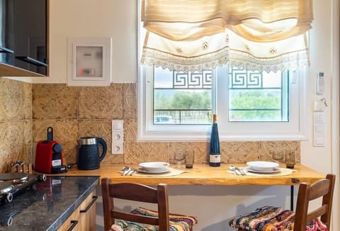 Dining corner with garden views and a welcoming atmosphere