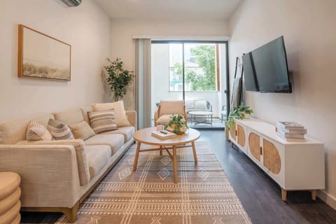 Come home to this bright and airy living room after a morning out for breakfast