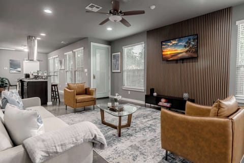 Kick back, sink into the sofa, and let the living room do its thing—comfort, style, and all the good vibes included. Perfect for binge-watching, board games, or just pretending you live here.