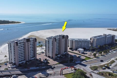 At the southern tip of Estero Island, this beachfront condo offers unmatched views of Big Carlos Pass, the Gulf, and miles of natural shoreline.